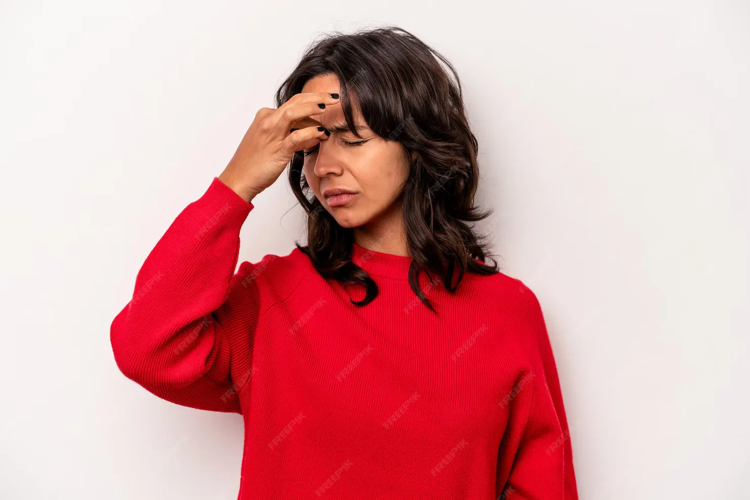 woman in red sweatshirt having an eye irritation image